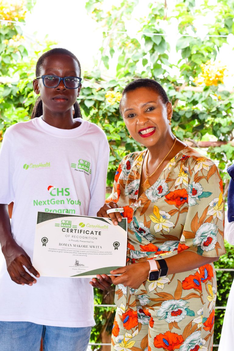 adolescent receiving participation certificate CHS NextGen Youth Program